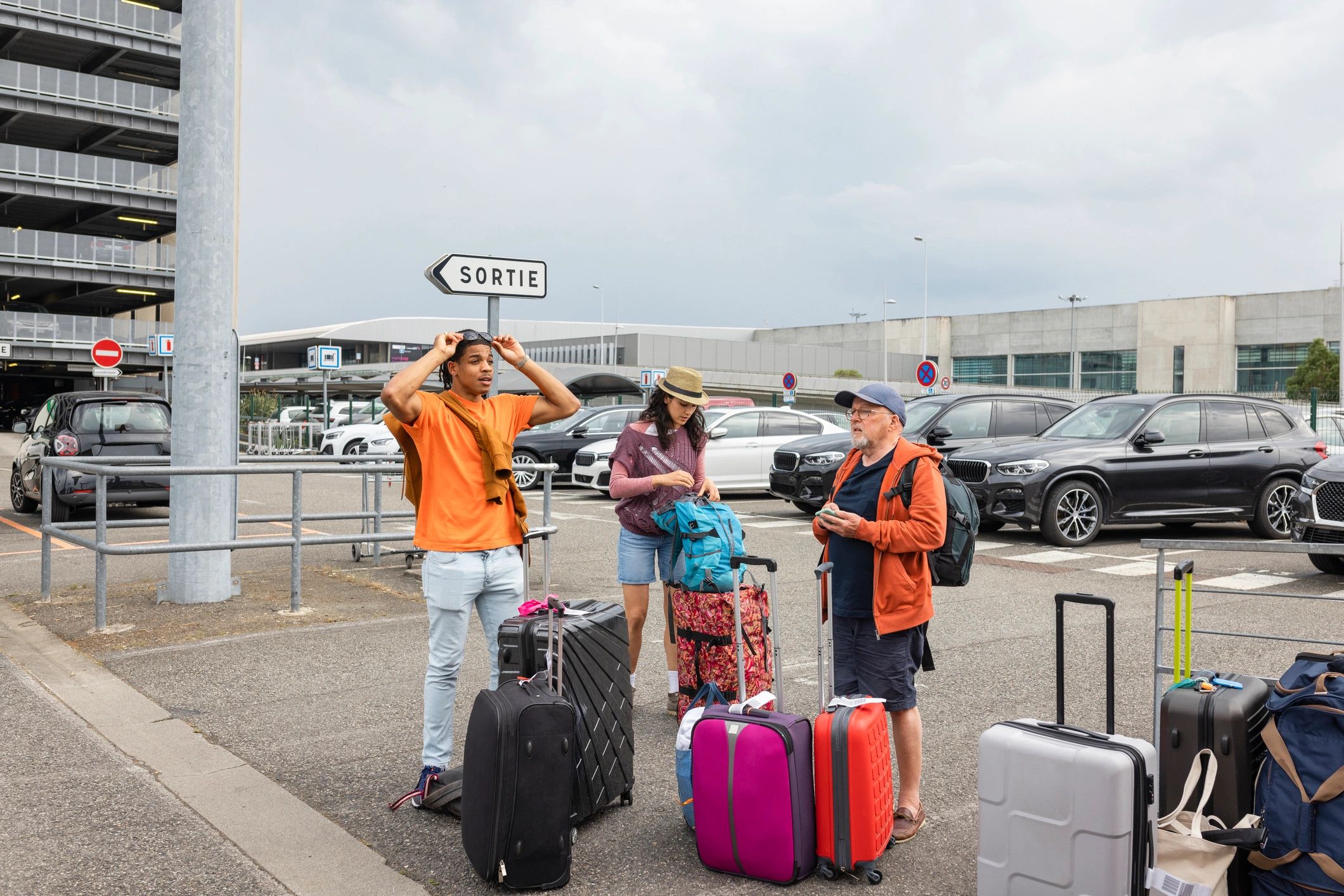 Travelers waiting for rental car service